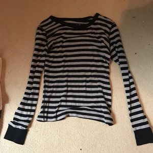 a black and grey striped shirt